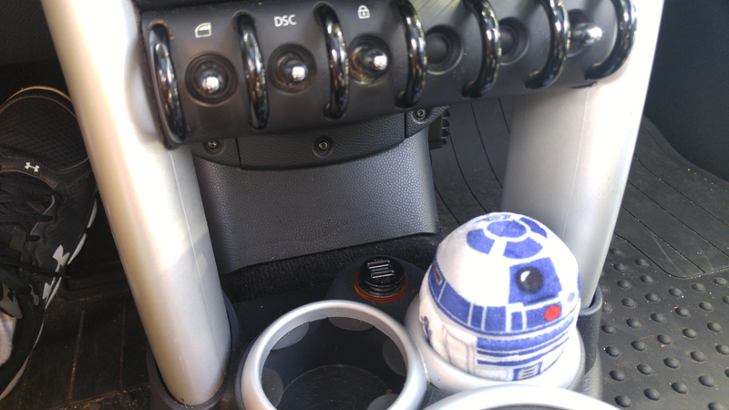 Hi R2! He’s about the only thing that fits in those cup holders.